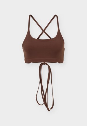 Top corto marrone con sottili spalline incrociate e lunghe stringhe che pendono dal centro della schiena.