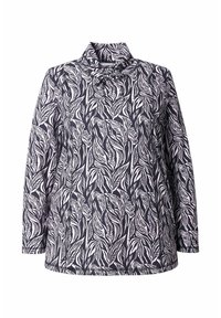 Haut à manches longues avec un col montant, en tissu à fond bleu marine et motif de feuilles blanches, texture douce et coupe décontractée.