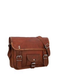 Brown leather messenger bag with front buckle straps, a small front pocket, and an adjustable shoulder strap.
