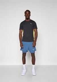 Puma RUN VELOCITY SHORT - Sports shorts - dark indigo