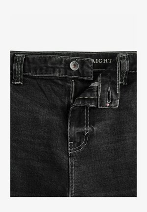 Fekete egyenes lábú farmernadrág, cipzárral, ezüstgombbal és kontrasztos fehér varrással az összes varraton és zseben.