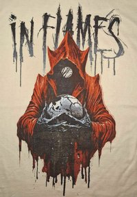 Black and orange graphic t-shirt featuring a cloaked figure holding a cracked skull, with "IN FLAMES" text above in a dripping style.