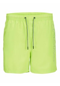 Bañador verde lima con cintura elástica, cordón ajustable y logo impreso en el lateral. Fabricado con un material ligero y de secado rápido.