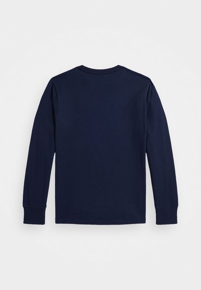 T-shirt à manches longues bleu marine en coton. Il présente un col rond et des poignets ajustés. Texture lisse sans motifs ni accents.