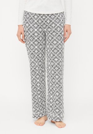 Svart och vitmönstrade pyjamabyxor med blomsterdesign; tillverkade av mjukt tyg, rak benstil och resårmidja.