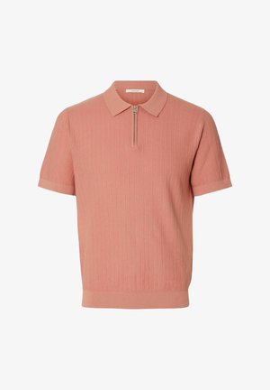 Meeste kortsete varrukatega lõheroosa kudumiga polo särk tekstuurse mustriga ja ees tõmblukuga sulgemisega.