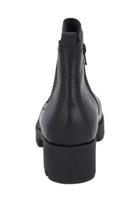 Bottine en cuir noir avec un talon carré, dotée d'une fermeture éclair à l'arrière et de côtés texturés, finition lisse et bout arrondi.