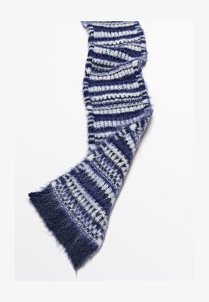 Striped scarf with soft, fuzzy texture; colors include navy blue, light gray, and white; features varying stripe widths and fringed ends.