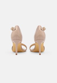 LASCANA Sandaalit nilkkaremmillä - beige