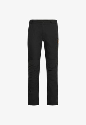 Pantalones exteriores negros con una textura suave, paneles de rodilla reforzados, bolsillo lateral con herrajes en contraste y puños ajustables.
