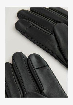 Guanti in pelle nera con una superficie liscia, cuciture dritte e un design classico con punte arrotondate, esposti affiancati.