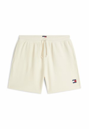 Cremefarbene, strukturierte Strickshorts mit elastischem Bund, Kordelzug, Seitentaschen und Tommy Jeans Logo-Patch am linken Bein und in der Mitte des Bundes.