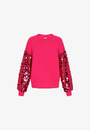 Soe pehme roosa sviiter pika varrukaga, millel on läikivad punased sädelused. Ümmargune kaelus ja ribakudumiga mansetid täiendavad disaini.