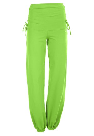 Pantaloni a gamba larga verde lime realizzati in tessuto morbido. Presentano una vita alta con lacci regolabili e polsini elasticizzati all'orlo.