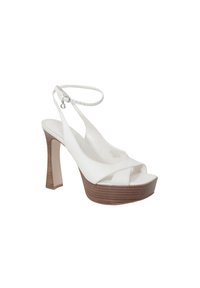 Sandali platform bianchi open-toe con design incrociato, cinturino alla caviglia e tacco in legno texturizzato. Materiale sintetico elegante.
