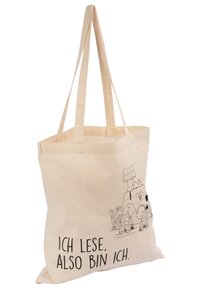 Borsa di tela in colore naturale con manici lunghi, caratterizzata da un design a cartone animato e dalla scritta "ICH LESE, ALso BIN ICH" stampata in nero.
