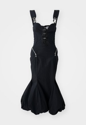 Fekete ruházat, strukturált melltartó résszel, állítható pántokkal, cipzáras oldalzsebekkel és bővülő alsó szegéllyel. Simító anyag, enyhe fénylő felülettel.