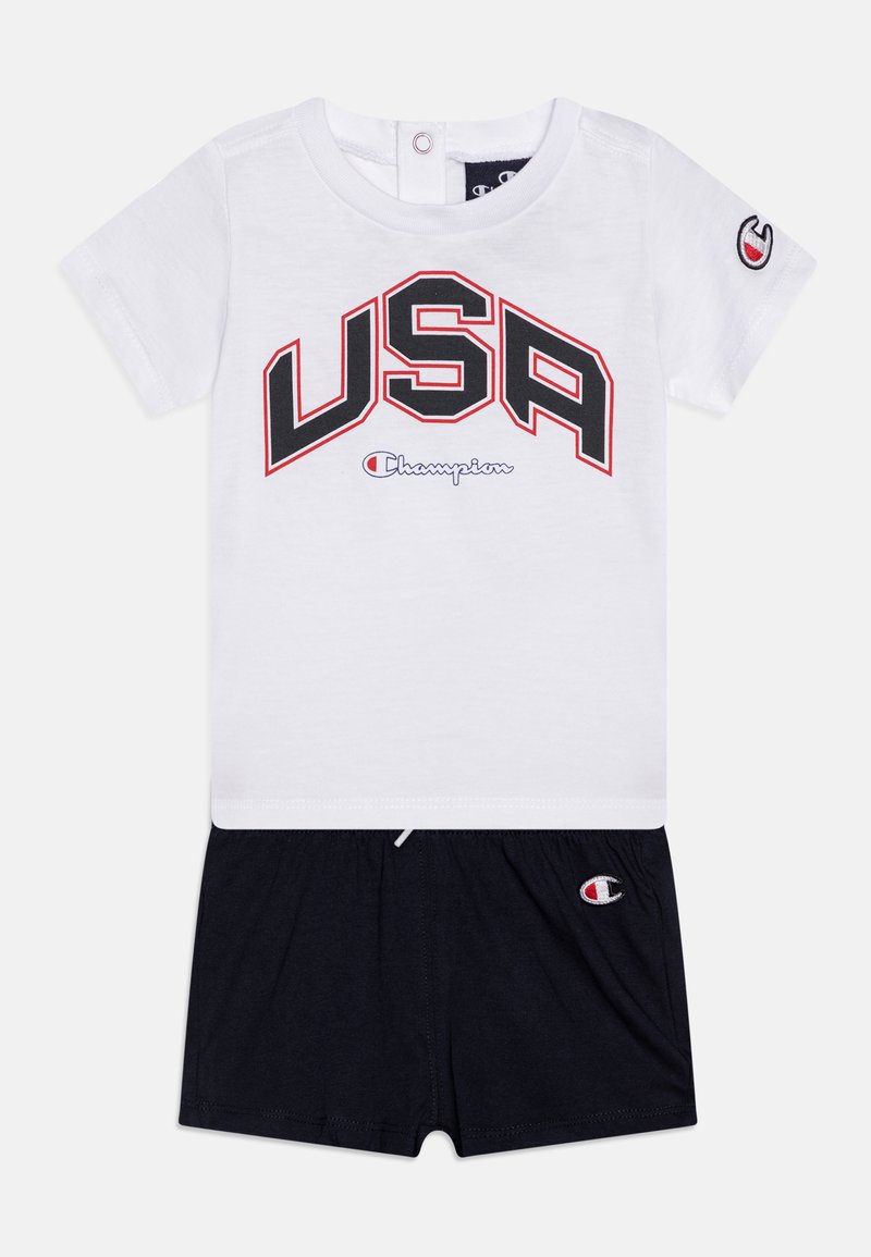 White cotton t-shirt with "USA" and "Champion" logo in black and red, paired with navy blue shorts featuring an embroidered logo.