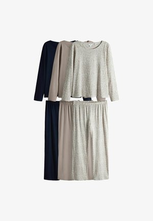 Set of four long-sleeve tops and pants in navy, beige, and a leopard print pattern. Cotton material with a relaxed fit and elastic waistbands.