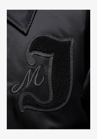 Wybrany, black gym red