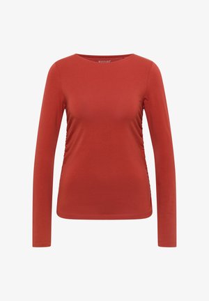 Rust-colored long-sleeve women's top with a round neckline and subtle side ruching, made of smooth fabric.
