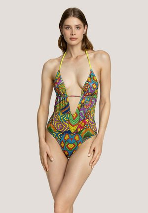 Costume da bagno intero colorato con scollatura a V profonda, spalline a collare e un vivace motivo geometrico in verde, rosso e blu.