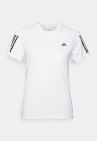 Valkoinen lyhythihainen urheilupaita, jossa on mustat kolmisauva-akselit olkapäillä ja Adidas-logo rinnassa. Sileä kangastunne.