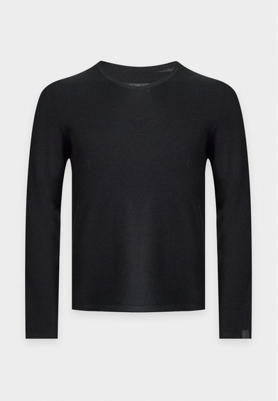 Pull noir à manches longues avec col rond et texture fine en maille, présenté sur un fond gris clair uni.