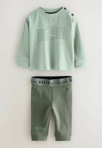 Mintgrünes Baumwolle-Set für Kleinkinder, bestehend aus einem Langarm-Oberteil mit Grafikprint und passenden Leggings mit elastischem Taillenbund.