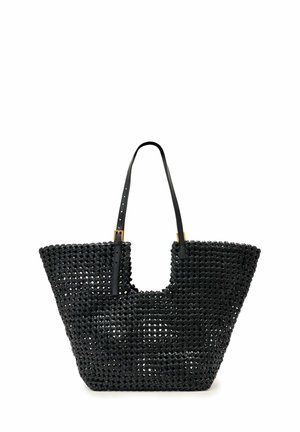 Sac cabas noir tissé, avec de longues anses réglables et des détails métalliques dorés, présenté sur fond blanc.