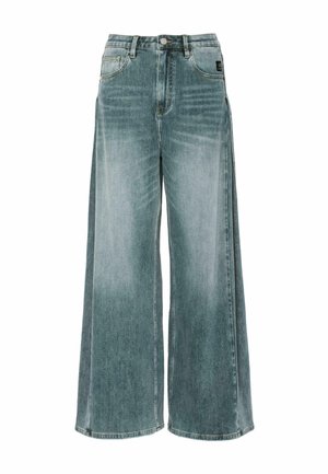 Jeans a gamba larga in denim blu sbiadito. Presentano cinque tasche, passanti per cintura e una chiusura con zip e bottone. Tessuto liscia con un sottile gradiente di lavaggio.