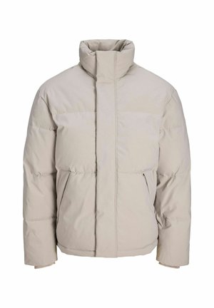 Hellbeige gesteppte Jacke mit hohem Kragen und Vordertaschen, gestaltet für kaltes Wetter mit minimalistischem, sauberem Stil.
