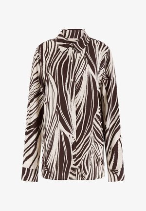 Camicia a maniche lunghe con bottoni, motivo astratto a strisce di zebra bianche e nere e colletto appuntito.