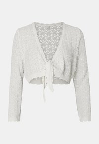 Bílý zkrácený kardigan s dlouhými rukávy, který má pletený vzor, zavazování vepředu a vlnité okraje na spodním lemu a rukávech.