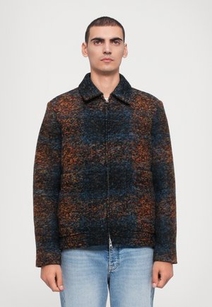 Zip-up jacket in multicolored fabric featuring dark blue, orange, and brown textures; has a pointed collar and two side pockets.
