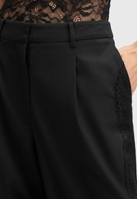 AllSaints LACEY  - Stoffhose - black