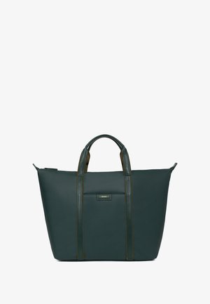 Dark green tote bag made of textured material, featuring two sturdy handles, contrasting trim, and a front pocket with a small logo plaque.