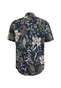 Camisa de manga corta con fondo azul marino oscuro y patrones florales en verde y blanco, confeccionada en una tela ligera con un corte relajado.