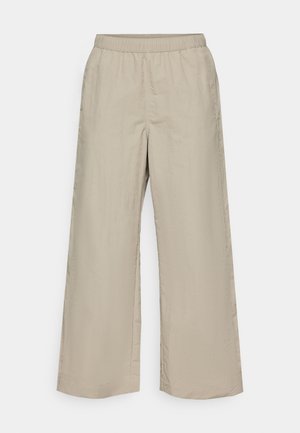 Wide-leg trousers in light beige fabric with an elastic waistband, smooth texture, and no visible hardware or patterns.
