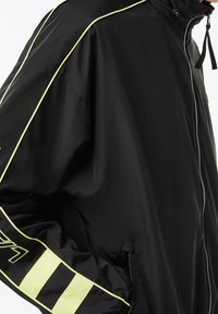 Lacoste Träningsjacka - black