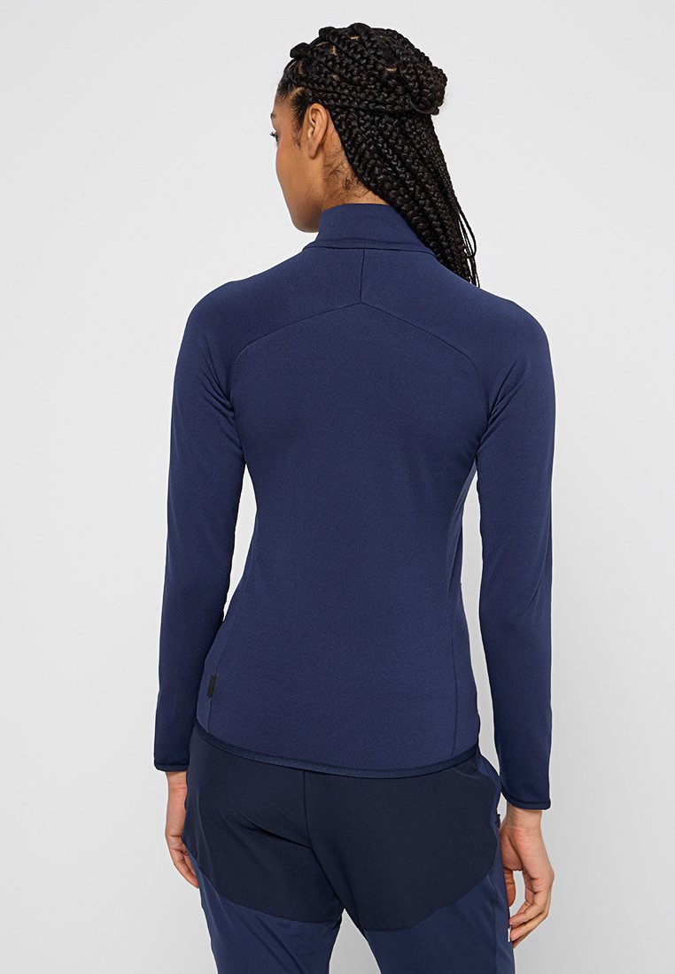 Top atletico a maniche lunghe di colore blu navy, caratterizzato da un colletto alto, una forma aderente, un tessuto morbido e dettagli delle cuciture. Adatto per l'abbigliamento sportivo.