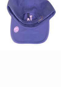Purple baseball cap with a curved brim, adjustable strap, and inner label with "AT." Features a pink sticker with baseball graphic.