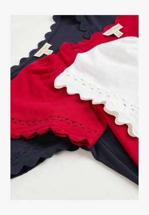 Kolme tippu sinises, punases ja valges puuvillas, millel on lainelised äärised. Punase ja valge tippu äärtel on pitsist detailid.