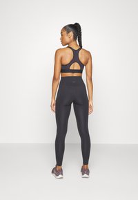 Under Armour HIGH - Sujetadores deportivos con sujeción alta - black/jet gray
