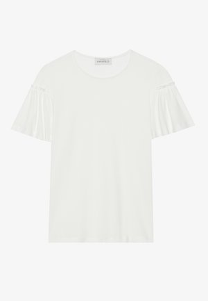 T-shirt blanc avec des manches courtes et volantées. Fabriqué en tissu doux et lisse. Présente un col rond et des détails de couture subtils.