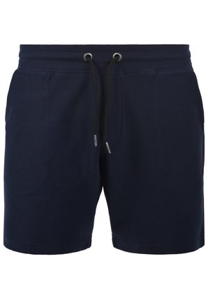 Marineblå bomullsshorts med teksturdesign, elastisk midje, snøring og sidelommer for ekstra funksjonalitet.