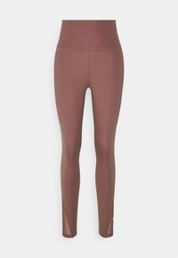 Bruna träningsleggings med hög midja, slät textur och smalnande ben; har meshdetaljer vid anklarna för ökad andningsförmåga.