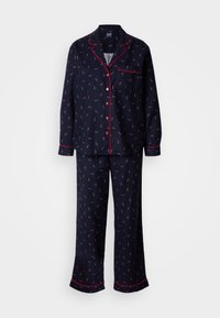 Ensemble de pyjama bleu marine avec passepoil rouge, comprenant un haut boutonné et un pantalon assorti orné d'un petit imprimé intégral. Tissu doux, coupe décontractée.