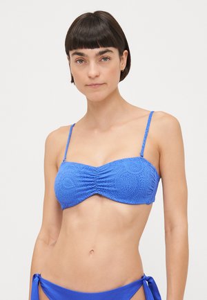 Blue bikini top with textured paisley pattern, bandeau style, gathered center, and thin adjustable straps. Smooth fabric with a bright finish.
