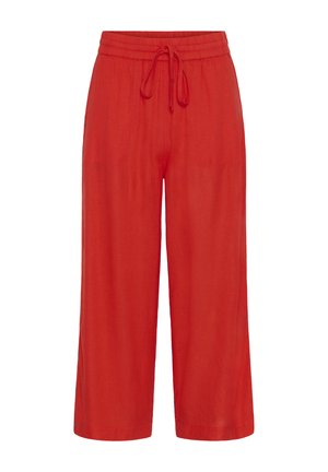 Pantalon rouge ample et court avec taille élastique et lien à nouer sur le devant, fabriqué en tissu léger.
